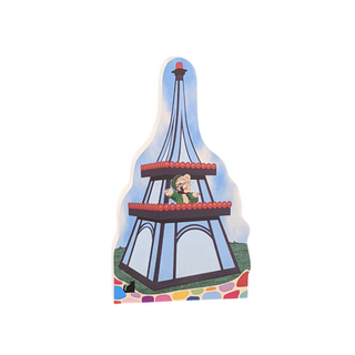 3/4" thick wooden replica with an illustration of a Colorful toy figure of a character on top of a tower with a blue sky background