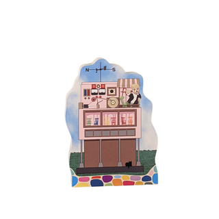 3/4" thick wooden replica with an illustration of a  retro-style building with a clock and people on a white background