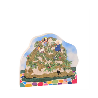 3/4" thick wooden replica with an illustration of a mister rogers toy prop
