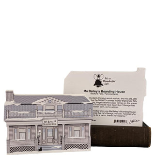 3/4" thick wooden replica with an illustration of a  boarding house with a book titled 'It's a Wonderful Life' on a white background