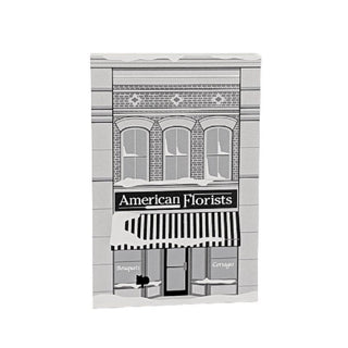 3/4" thick wooden replica with an illustration of a florist shop named 'American Florists' with a striped awning.