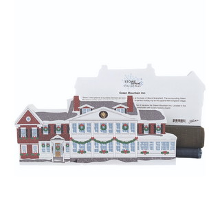 3/4" thick wooden illustration of a building with Christmas decor and a back model with text on a white background