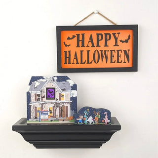 Halloween-themed decorative sign with a haunted 3/4" thick wooden house model on a shelf.
