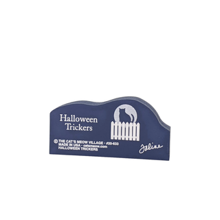 3/4" thick wooden  Halloween Trickers cutout with white text and graphics on a white background