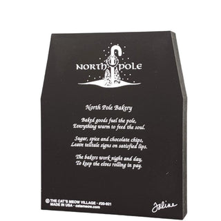 Black of product with white text and North Pole Bakery logo on a white background