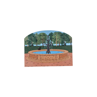 3/4" wooden replica with an illustration of a fountain with a brick basin in a park setting