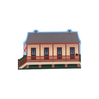 3/4" wooden replica with an illustration of a tan house with red accents 