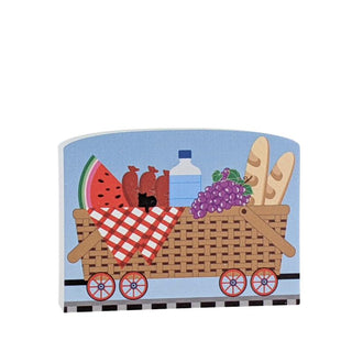 3/4" Wooden replica with a Illustration of a picnic basket with food items on a blue background