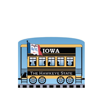 3/4" Wooden replica with a Illustration of a train car labeled 'Iowa: The Hawkeye State' with a flag on a white background.