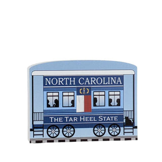 3/4" Wooden replica with a illustration with 'North Carolina' and 'The Tar Heel State' text on a blue background
