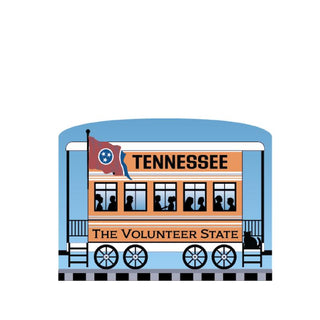 3/4" Wooden replica with a Illustration of a train car with 'Tennessee' and 'The Volunteer State' text on a white background