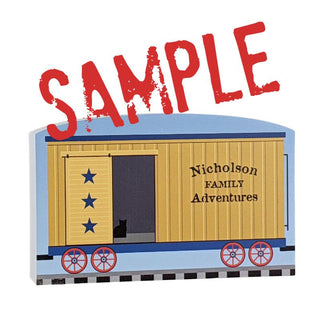 3/4" Wooden replica with a Illustration of a train car with 'Nicholson Family Adventures' text and 'SAMPLE' label above.