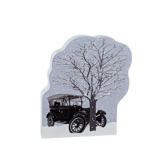 3/4" thick wooden replica with an illustration of a Vintage car under a tree with snowflakes on a gray background