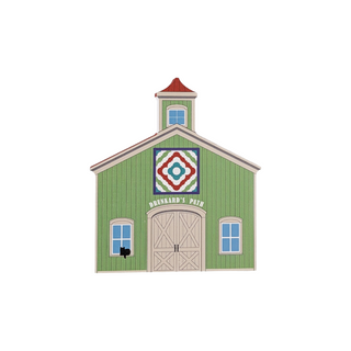 3/4" thick wooden illustration of a green barn with a quilt design on the side