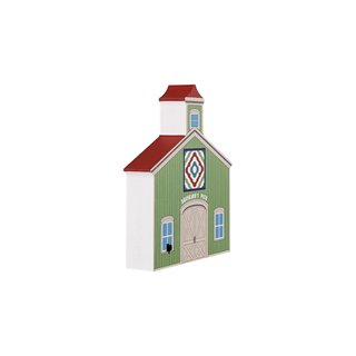3/4" thick wooden illustration of a green barn with a quilt design on the side