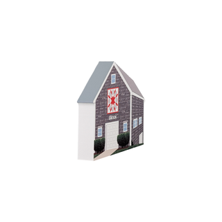 3/4" thick wooden illustration of a barn with a quilt design and 'Swoon' on a white background