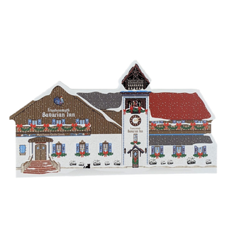 3/4" thick wooden  model of a Bavarian Inn with detailed architecture on a white background