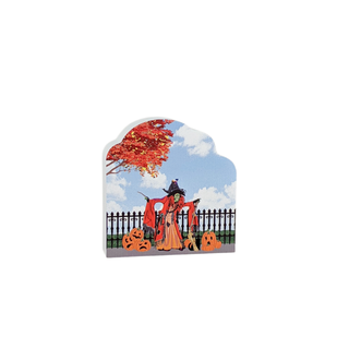 3/4" thick wooden Decorative Halloween sign with a witch and pumpkins against a scenic background.