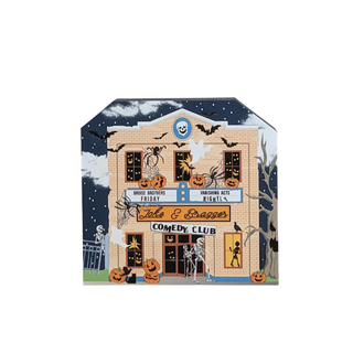 3/4" thick wooden Halloween-themed building with pumpkins, skeletons, and bats on a white background