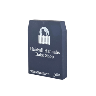 3/4" thick wooden cutout with 'Hairball Hannahs Bake Shop' branding on a white background