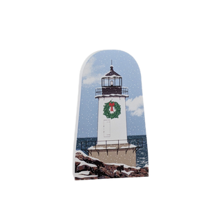 3/4" thick wooden  model with a lighthouse and Christmas wreath design.
