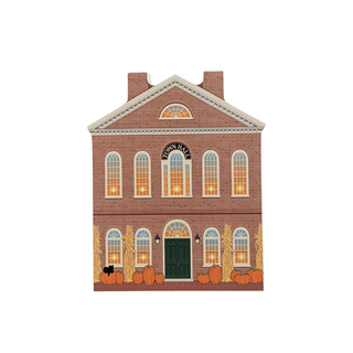 wooden replica with an illustration of a Brick building with 'Town Hall' sign and pumpkins on a white background