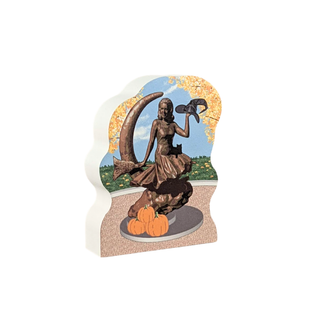 Decorative 3/4" thick wooden replica of the Samantha statue with witch hat, and pumpkins on a white background
