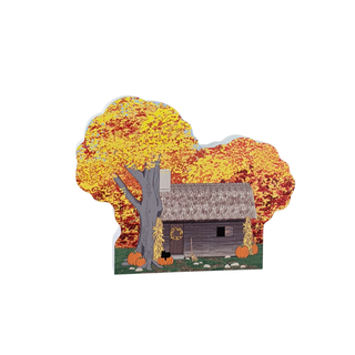 3/4" thick wooden Illustration of a cabin with pumpkins and a tree with autumn leaves on a white background