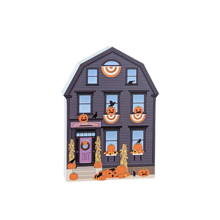 3/4" thick wooden Decorative Halloween house with pumpkins, ghosts, and ghosts on a white background