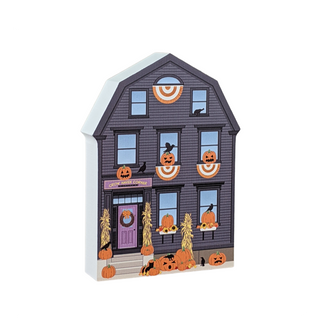 3/4" thick wooden Decorative Halloween house with pumpkins and ghosts on a white background