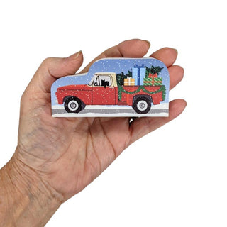 3/4" thick wooden replica with an illustration of a red truck and Christmas decorations.
