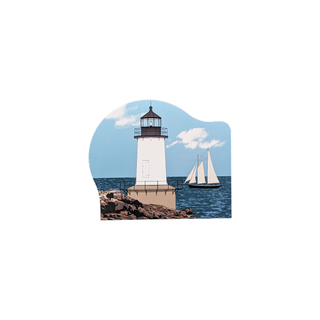 3/4" wooden replica with an illustration of Lighthouse with a sailboat in the background on a white background