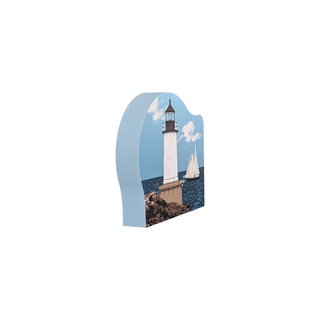 3/4" wooden replica with an illustration of a lighthouse and sailboat design on a white background