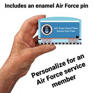 3/4" Wooden replica with a Hand holding a personalized Air Force card with text about an enamel pin and service member personalization.