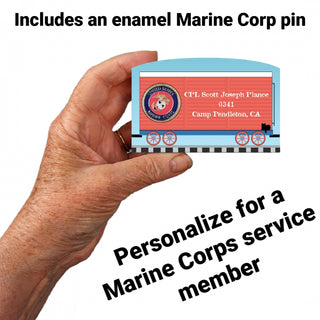 Hand holding a personalized 3/4" Wooden replica with a  Marine Corps service member card with an enamel pin included.