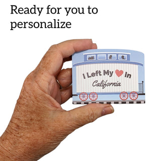 3/4" Wooden replica with a Hand holding a small card with 'I Left My Heart In California' text and decorative elements.