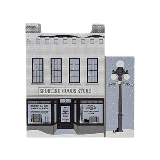 3/4" thick wooden replica with an illustration of a  Sporting Goods Store with a street sign in the background