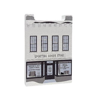 3/4" thick wooden replica with an illustration of a  Sporting Goods Store with brick facade and store front windows.