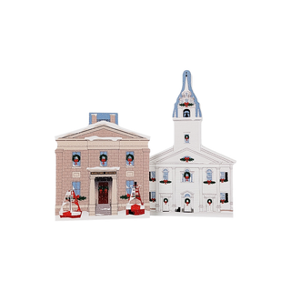 3/4" thick wooden illustrations of two town buildings with snow and Christmas decor