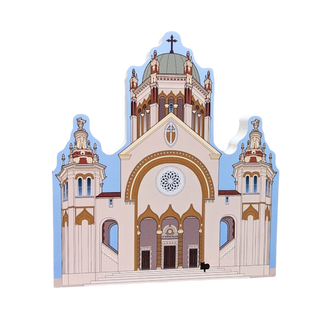 3/4" thick wooden illustration of a cathedral with detailed architecture on a white background