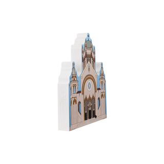 3/4" thick wooden illustration of a cathedral with detailed architecture on a white background