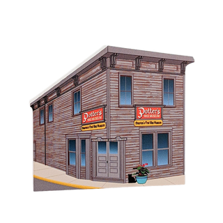 3/4" thick wooden illustration of a building facade with 'Potters Wax Museum' signs on a white background