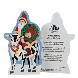 Decorative magnet with3/4" thick wooden replica with an Illustration of aHolstein cow, featuring text and a wreath.
