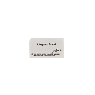Wooden replica with black text on a white background about a lifeguard stand.
