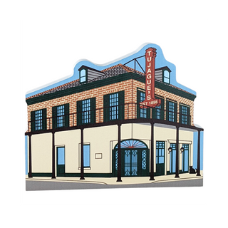 3/4" thick wooden illustration of a building with a sign reading 'Tujague's' on a white background