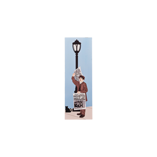 3/4" wooden replica with an illustration of a person holding a newspaper under a street lamp on a light blue background