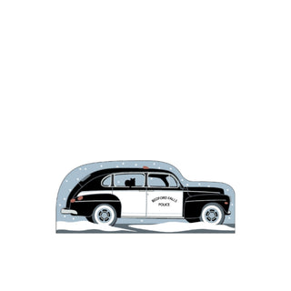 3/4" thick wooden replica with an illustration of a Vintage Bedford Falls Police car illustration on a white background