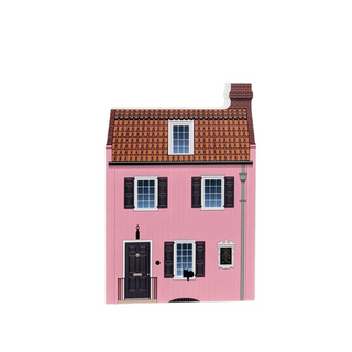3/4" thick wooden small model of a pink house with a brown roof on a white background