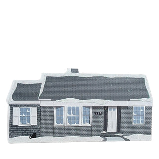 3/4" thick wooden replica with an Illustration of a gray house with snow on the roof