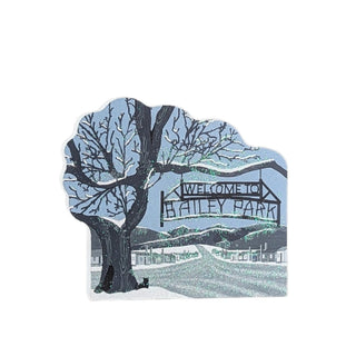 3/4" thick wooden replica with an illustration of a  winter scene of a tree and 'Welcome to Bailey Park' sign.